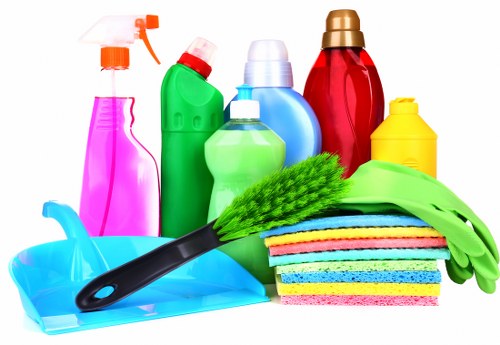 Professional sofa cleaning equipment being used in an N7 living room