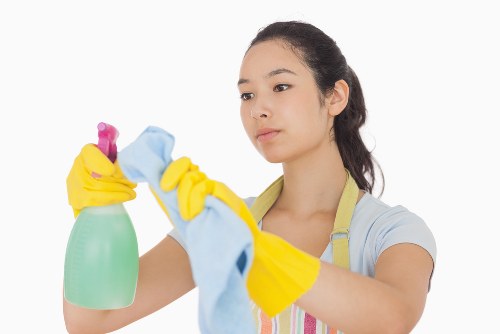 Manager discussing a carpet cleaning issue with staff
