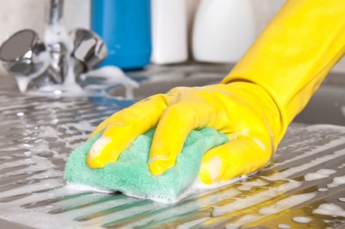 Careful deep cleaning of a sofa in a flat with limited access in N7